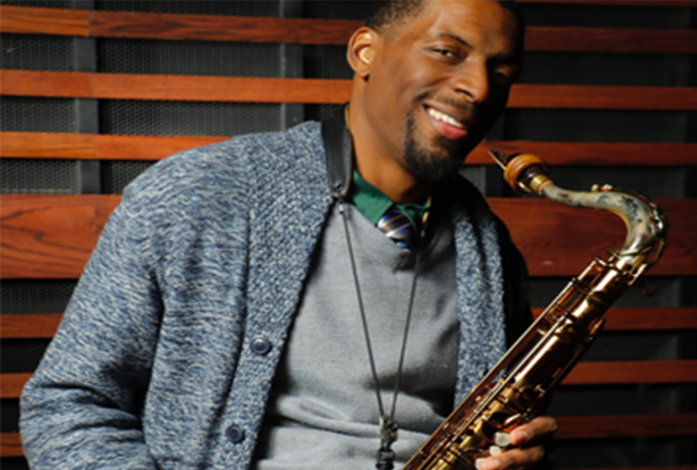 Quamon Fowler with his saxophone in the studio